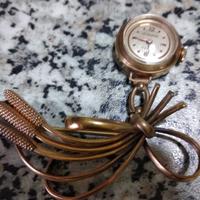 Orologio spilla