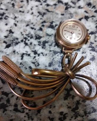 Orologio spilla