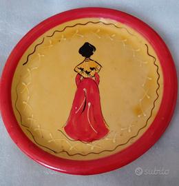 Piatto donna in costume