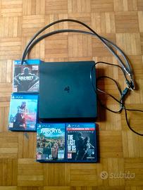 PlayStation 4 con cavi e 4 videogiochi 