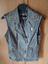 Bel gilet Zuiki in pelle e borchie. Molto Rock!