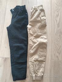 DUE PANTALONI NERO E BEIGE TG XXS BERSHKA 