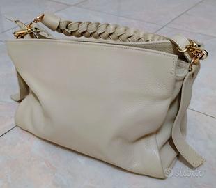 Borsa da donna color panna vera pelle firmata.