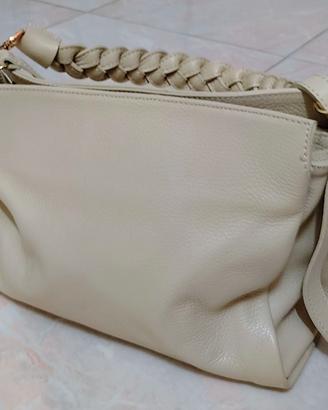 Borsa da donna color panna vera pelle firmata.