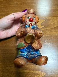 Pagliaccetto salvadanaio con tromba