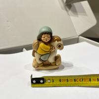 Thun bimbo su cavallo