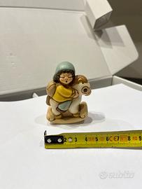 Thun bimbo su cavallo