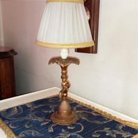 Antico lume in bronzo 