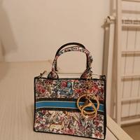 portamonete mini simile Dior