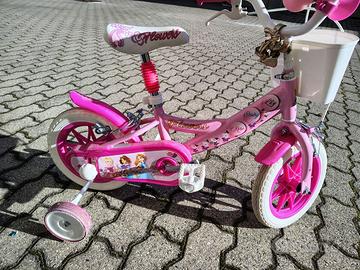 Bici bimba rosa con cestino  e rotelle 1 -3 anni