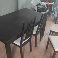 Tavolo Ikea nero allungabile con 4 sedie