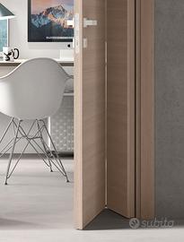 Porta a libro asimmetrica colore bianca Ral 9010