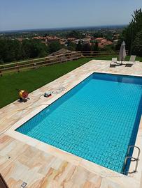 Bordo piscina in pietra di Luserna colore doré