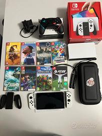 nintendo switch oled bianca + giochi e accessori