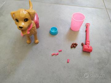 Cagnolino giocattolo mangia e fa la cacca