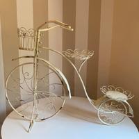 "Bicicletta porta fiori in ferro battuto anticato"