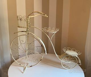 "Bicicletta porta fiori in ferro battuto anticato"