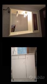 Specchiera e mobile bagno bianchi