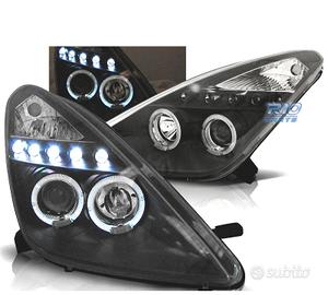 FARI TOYOTA CELICA T23 99-05 LED OCCHI ANGELI NERI