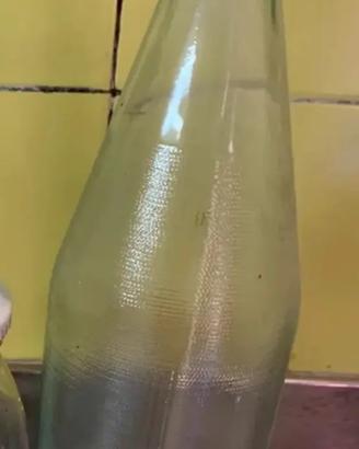 60 bottiglie litro 50 barattoli da litro