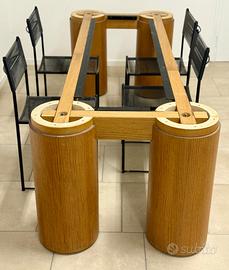 Tavolo in legno con vetro molato e sedie