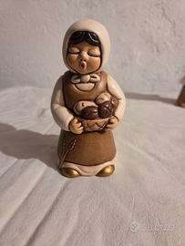 Donna con cesta di pane presepe thun giubileo