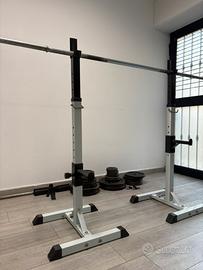 Rack con bilanciere e dischi in ghisa