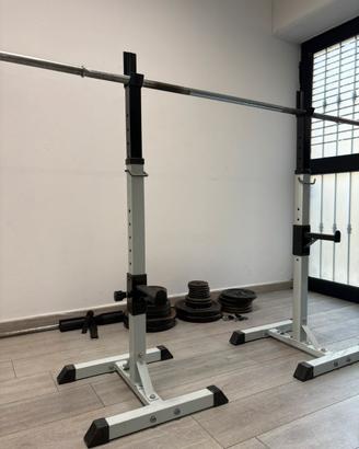 Rack con bilanciere e dischi in ghisa