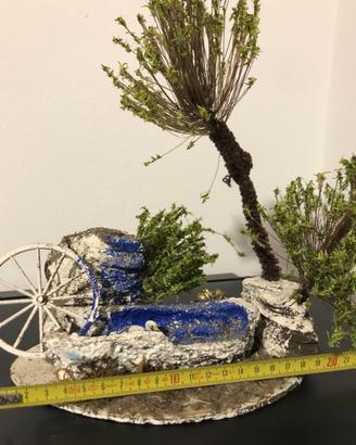 Decorazione presepe con cigno e palme