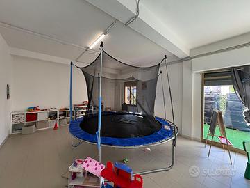 Tappeto elastico con rete di sicurezza