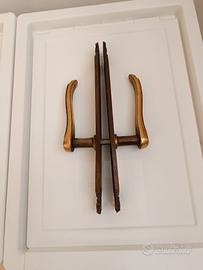 Tre maniglie d'epoca in ottone 