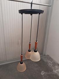 lampadario a tre luci .