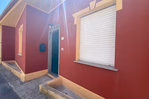 Appartamento al piano terra con giardino e garage