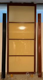 Porta scorrevole in legno e vetro