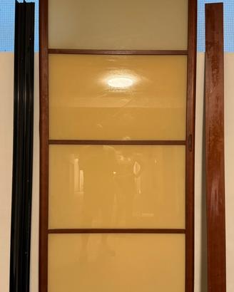 Porta scorrevole in legno e vetro