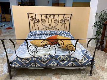 letto in ferro battuto riporti in ambra