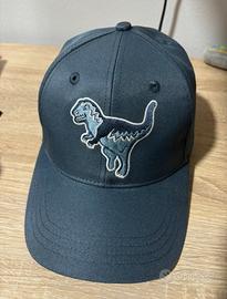Cappello Coach blu regolabile con dinosauro.