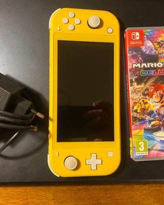 Switch Lite Gialla + mario Kart