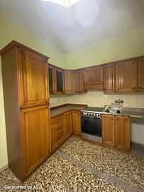 Cucina completa ad angolo in legno