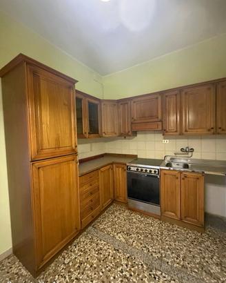 Cucina completa ad angolo in legno