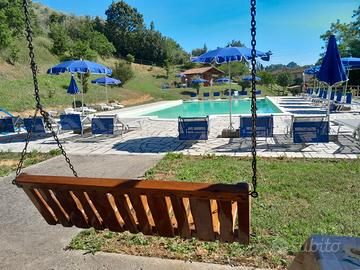 Agosto in casa in piscina in campagna toscana