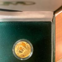 Moneta R/10 sud Africa oro 24 karati
