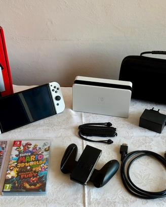 Nintendo Switch OLED Bianca accessoriata+ 3 giochi