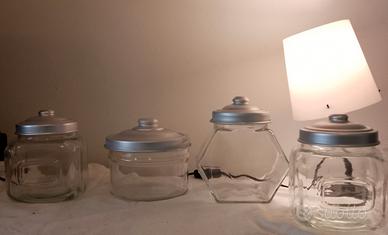 Contenitori di vetro con tappi di leggero metallo 