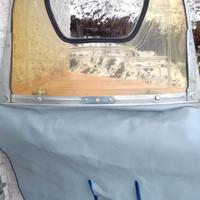 parabrezza d'epoca con oblo'