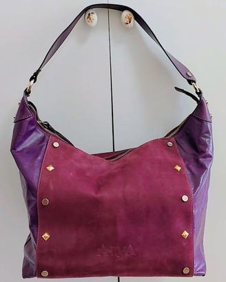 Borsa da donna vera pelle firmata colore fucsia.