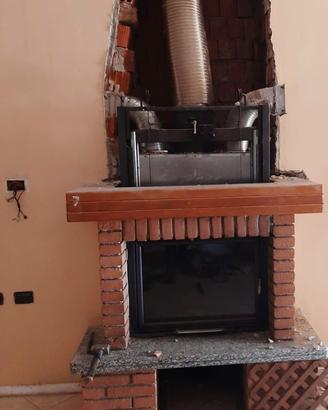Inserto fuoco areazione + granito e parte in legno