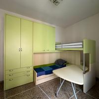 cameretta con letto a scomparsa