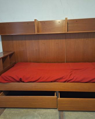 Letto singolo in legno con testiera contenitore