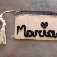 pochette con scritta tricotin